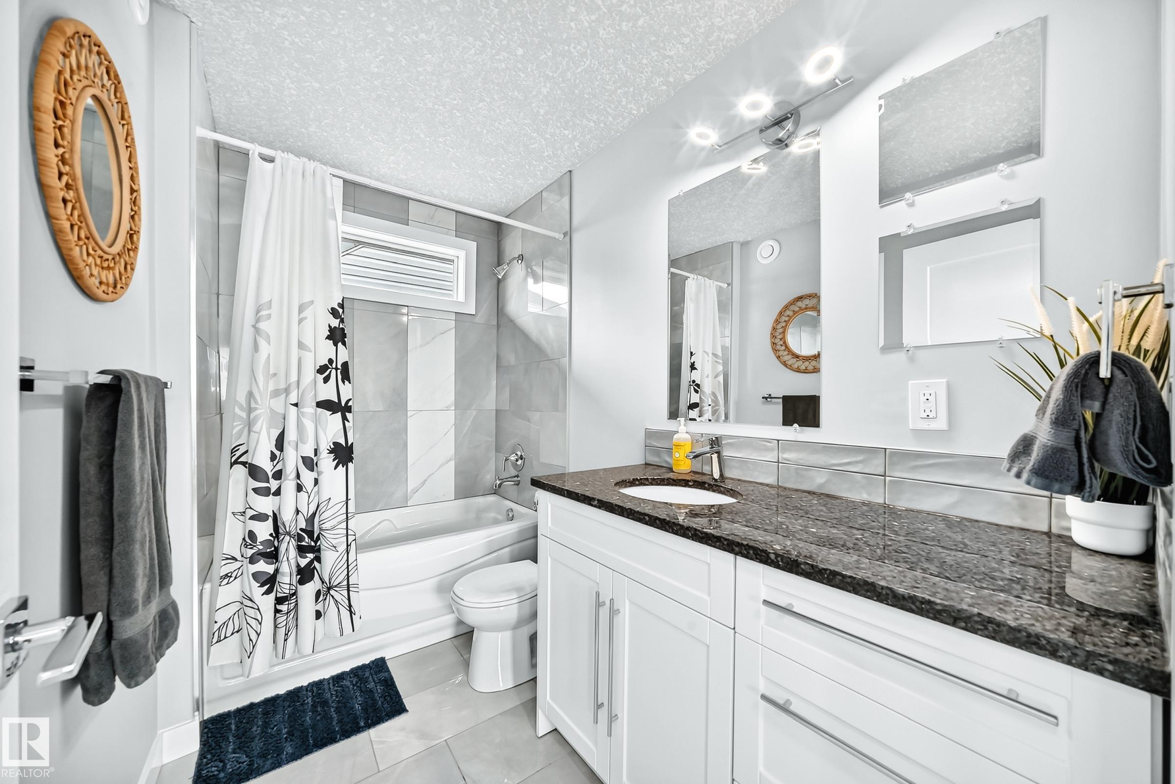 Photo 34 at 11463 64 Street NW, Highlands, Edmonton