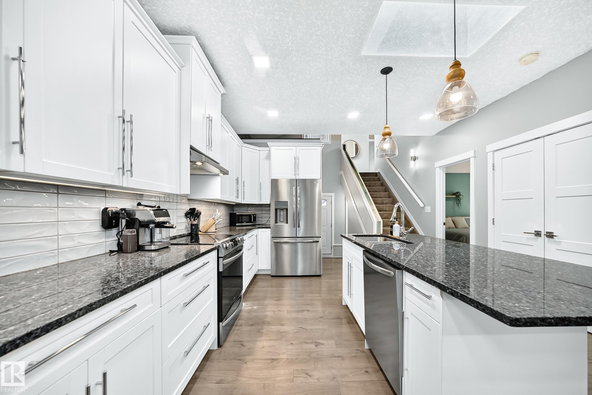 Photo 7 at 11463 64 Street NW, Highlands, Edmonton
