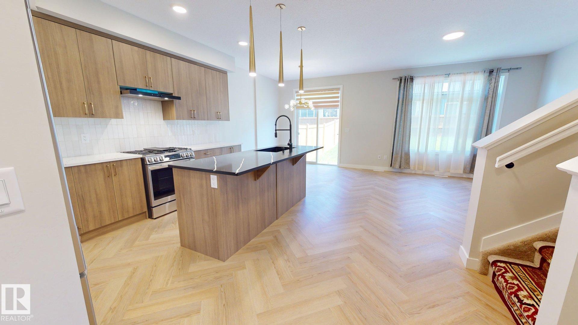 Photo 2 at 6404 27 Avenue SW, Mattson, Edmonton