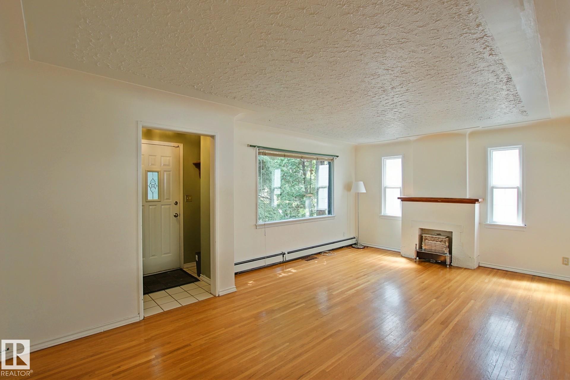 Photo 2 at 11242 56 Street NW, Highlands, Edmonton