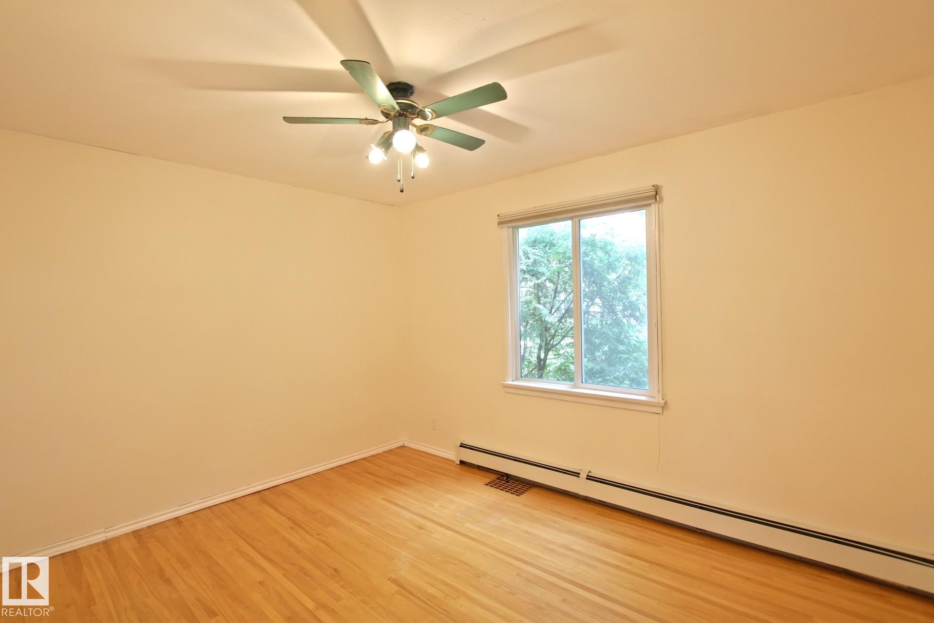 Photo 13 at 11242 56 Street NW, Highlands, Edmonton