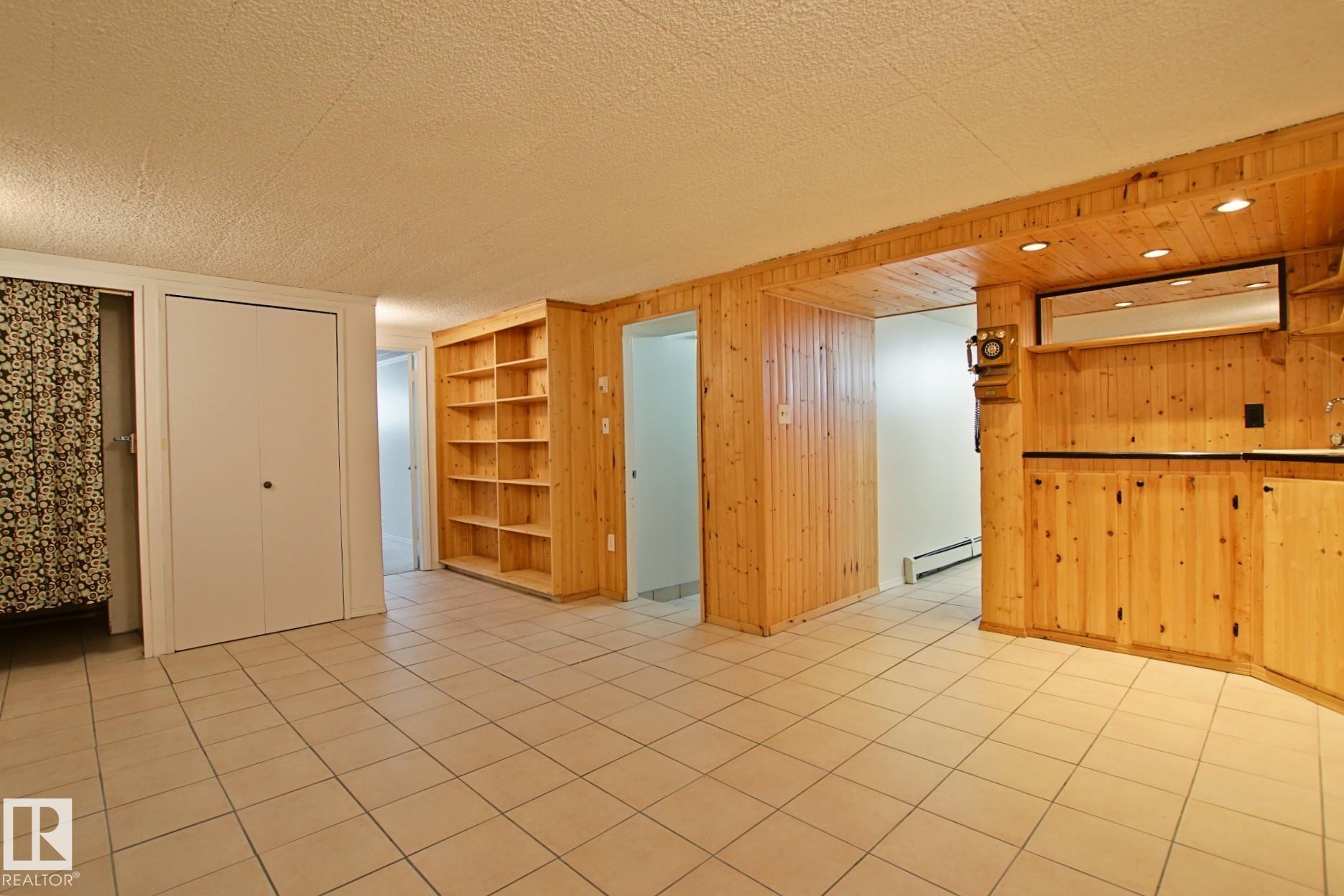 Photo 21 at 11242 56 Street NW, Highlands, Edmonton
