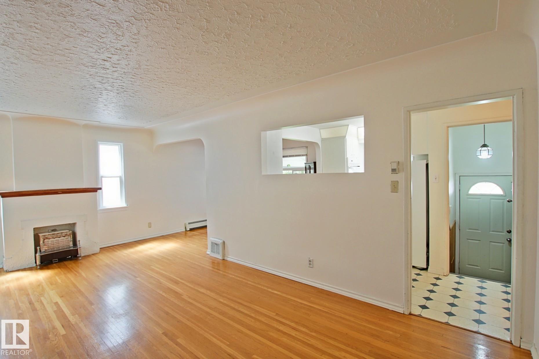 Photo 4 at 11242 56 Street NW, Highlands, Edmonton
