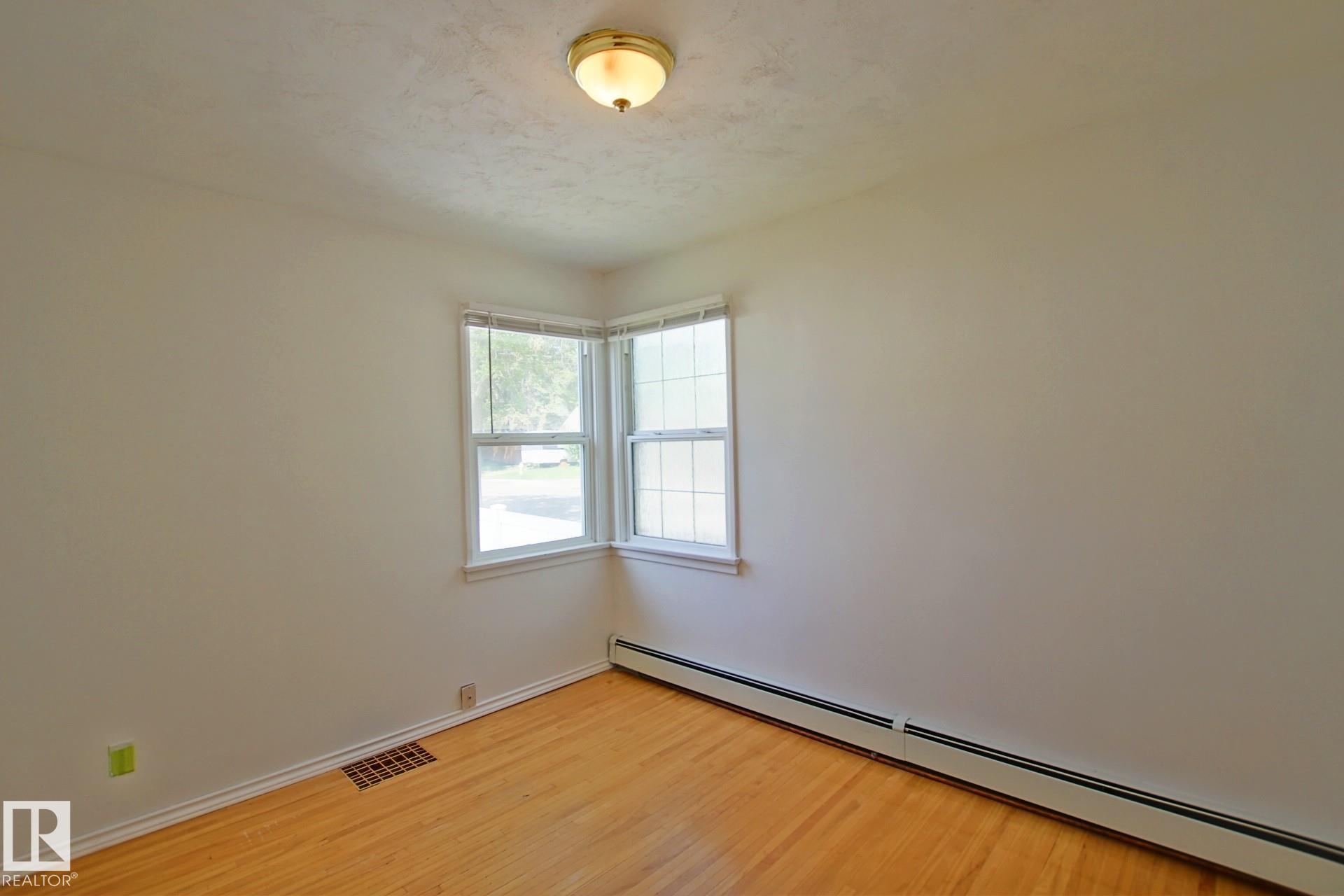 Photo 10 at 11242 56 Street NW, Highlands, Edmonton