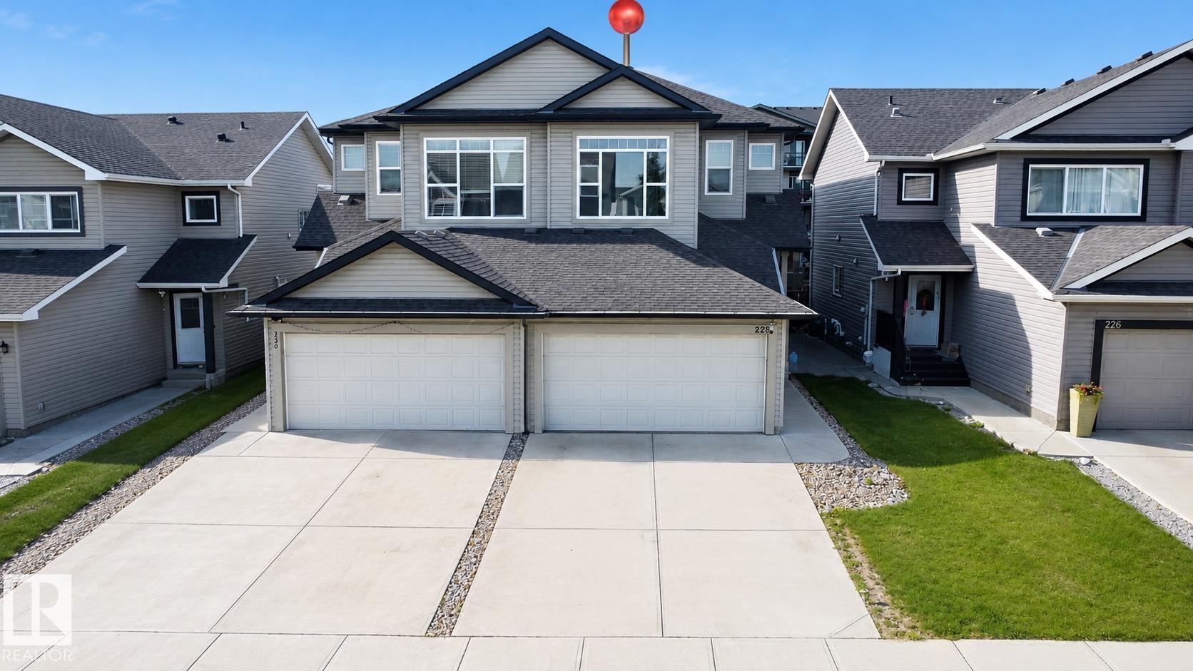 Photo 2 at 228 42 Avenue NW, Maple Crest, Edmonton