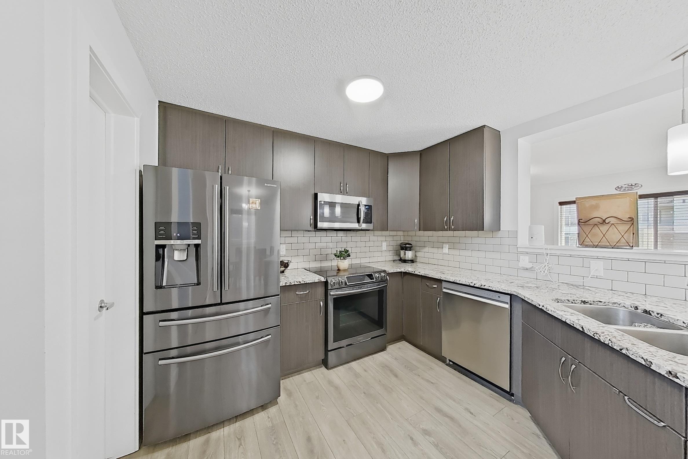 Photo 18 at 228 42 Avenue NW, Maple Crest, Edmonton