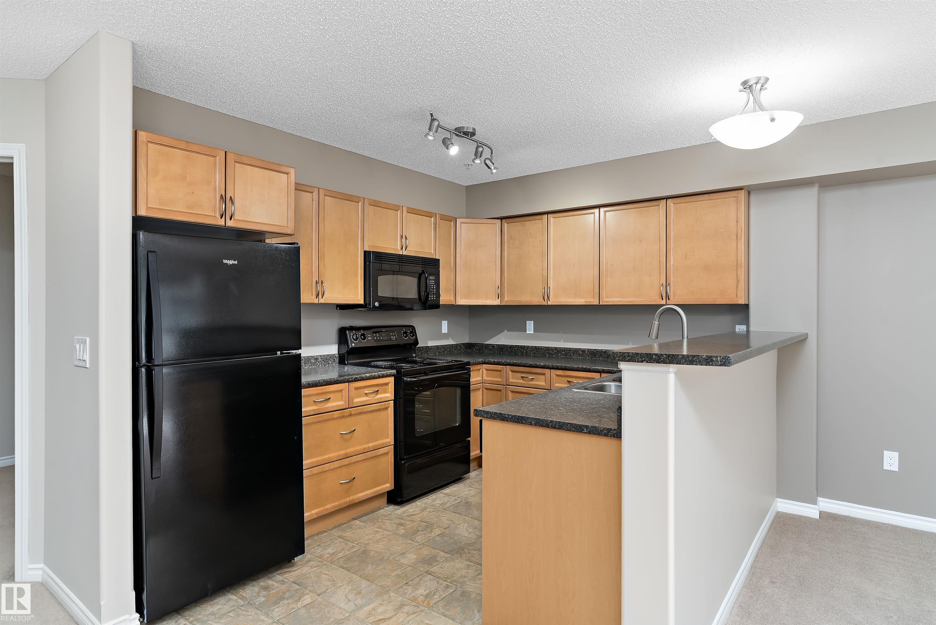 Photo 13 at 204 - 121 Festival Way, Centre In The Park, Sherwood Park
