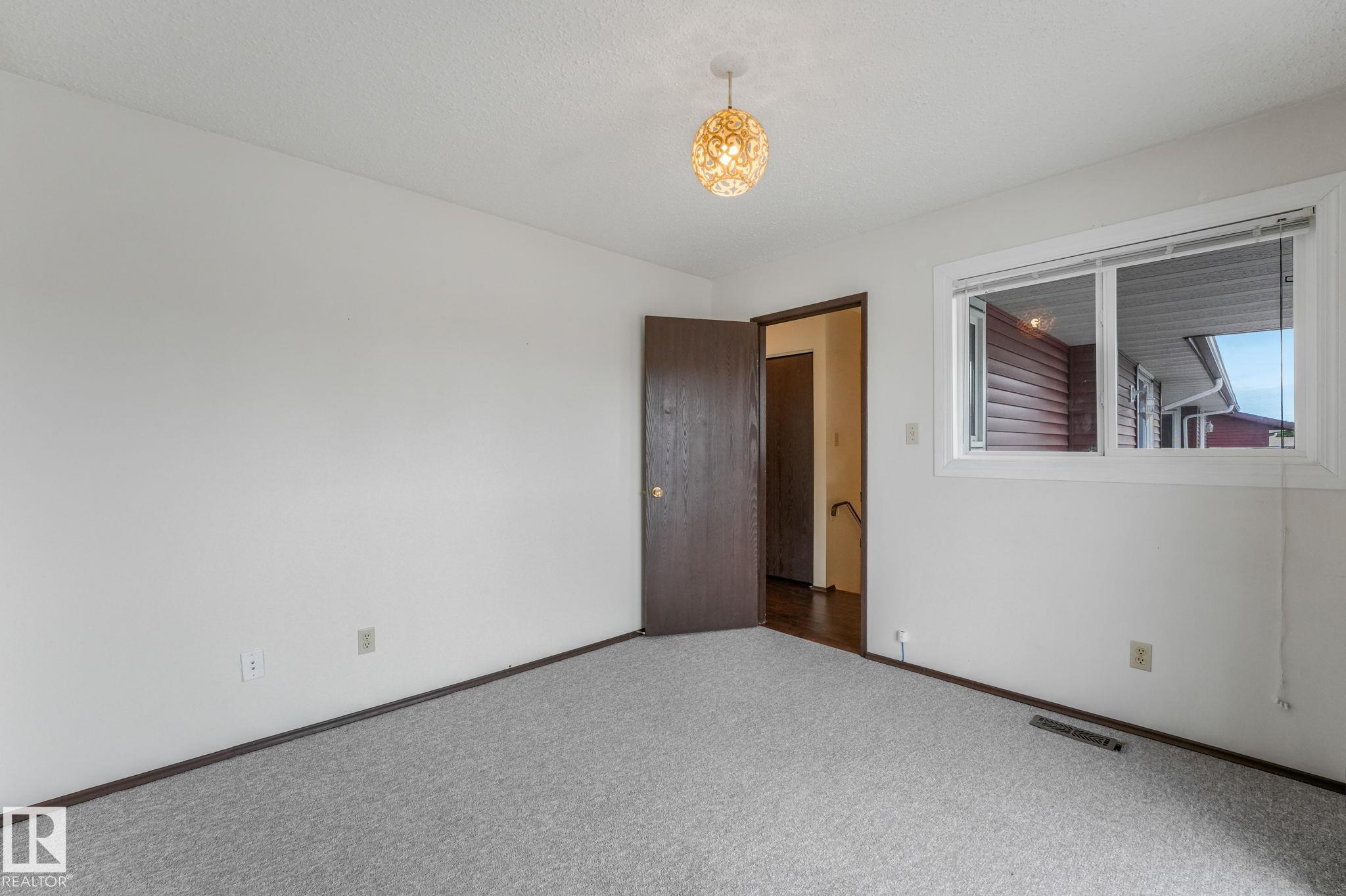 Photo 27 at 2921 130 Avenue NW, Belmont, Edmonton