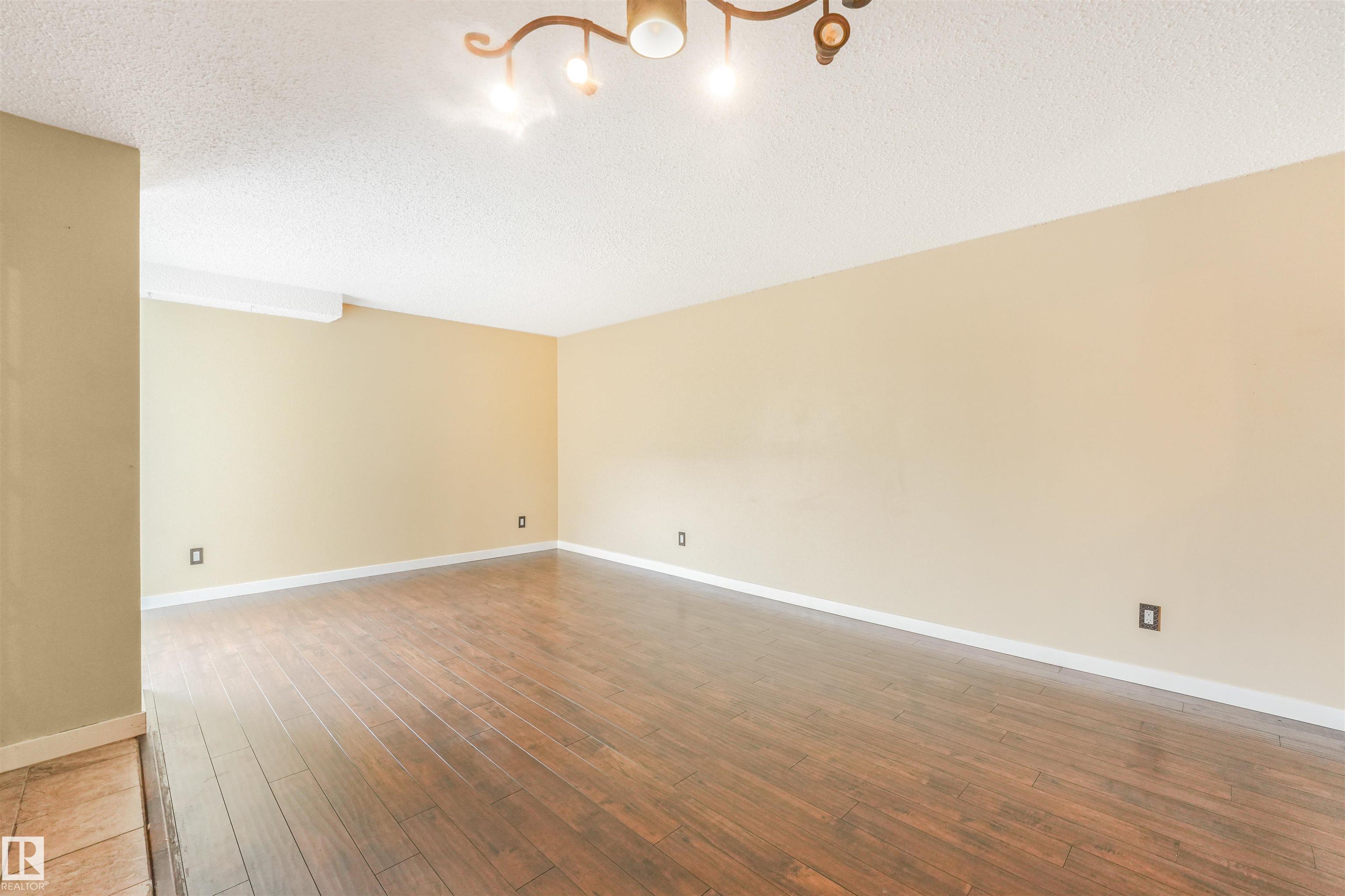 Photo 10 at 2921 130 Avenue NW, Belmont, Edmonton