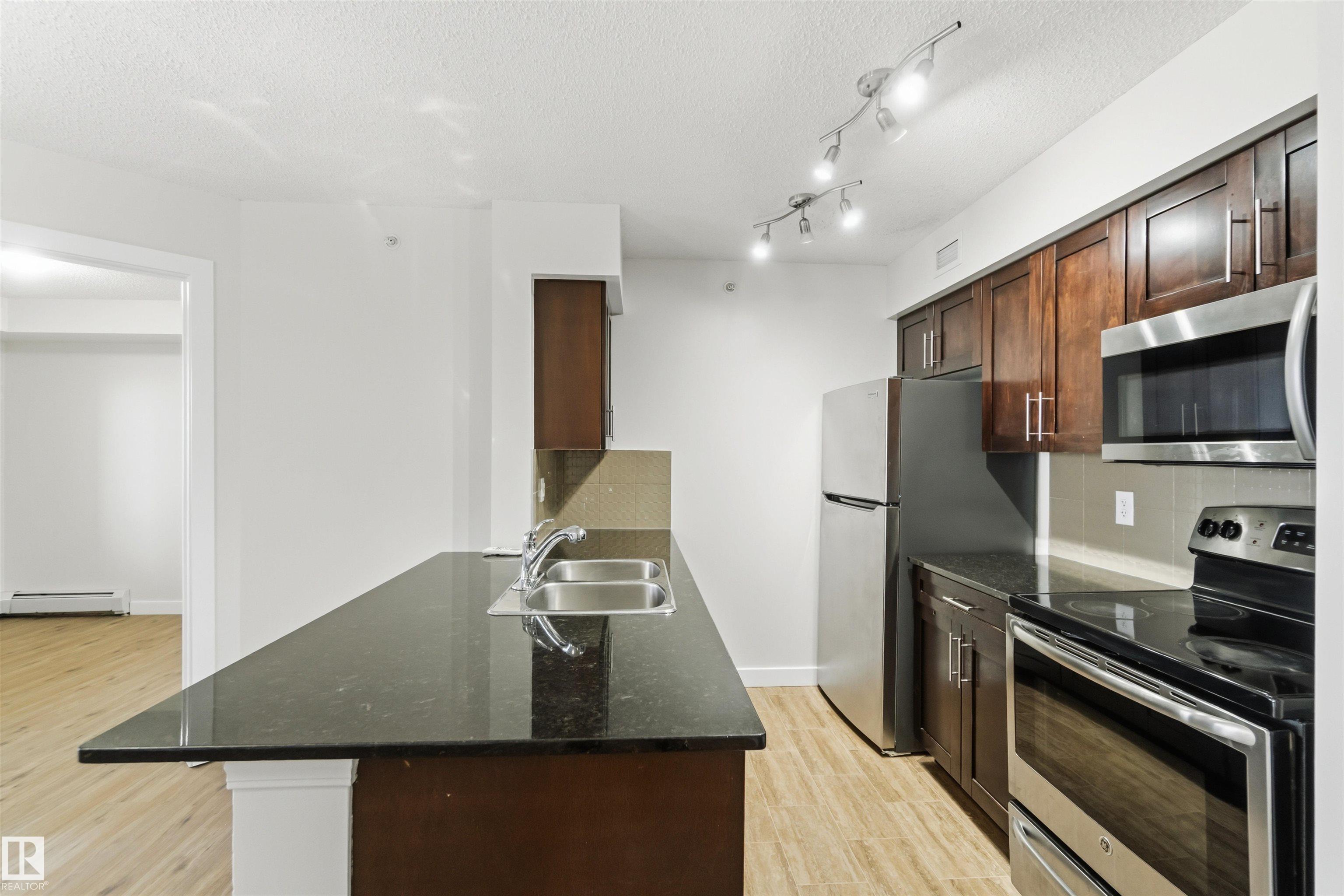 Photo 7 at 403 - 270 Mcconachie Drive NW, McConachie Area, Edmonton