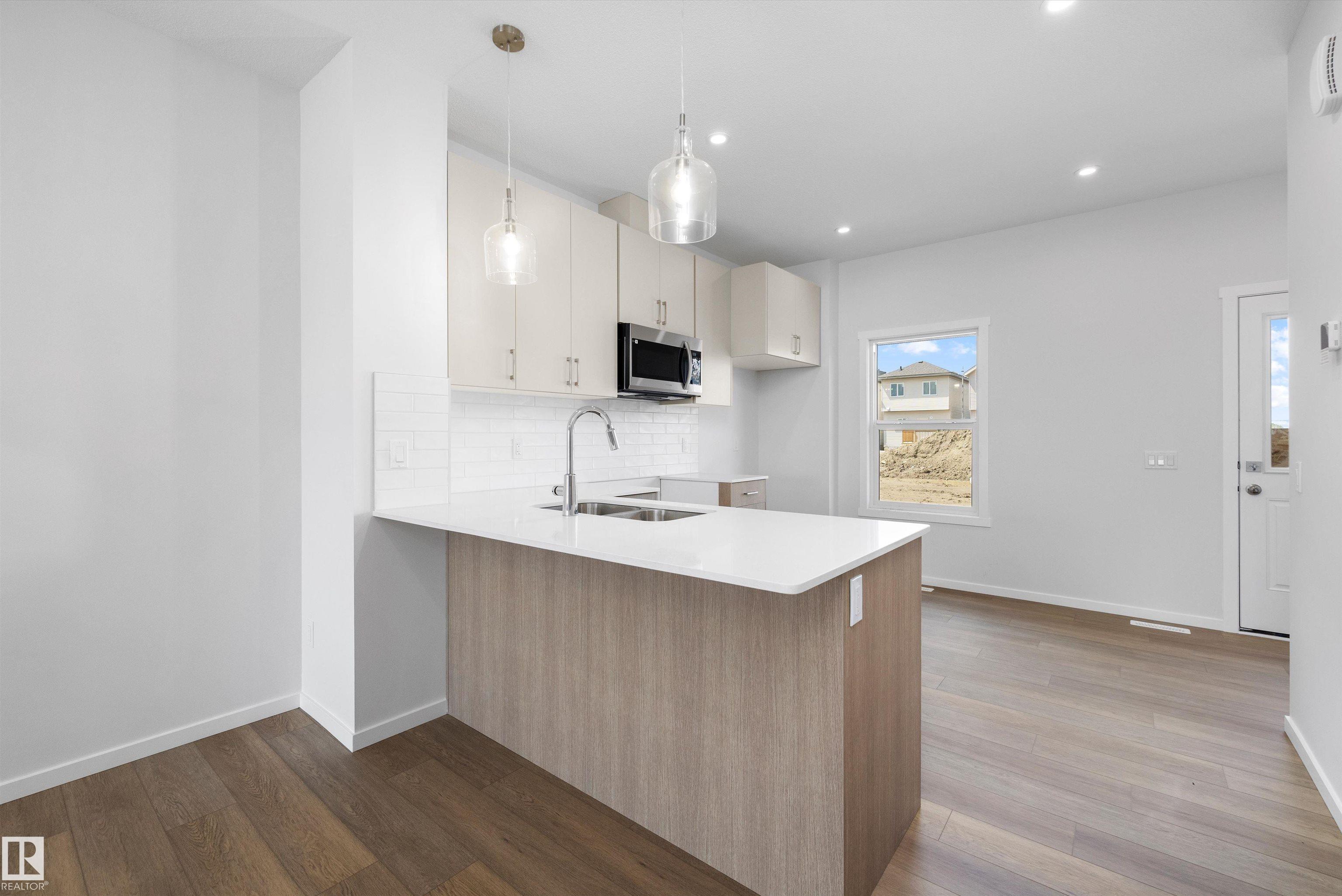 Photo 11 at 15656 3 Street NE, Quarry Ridge, Edmonton