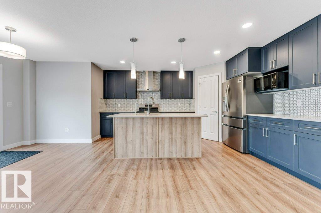 Photo 4 at 403 35 Avenue NW, Maple Crest, Edmonton