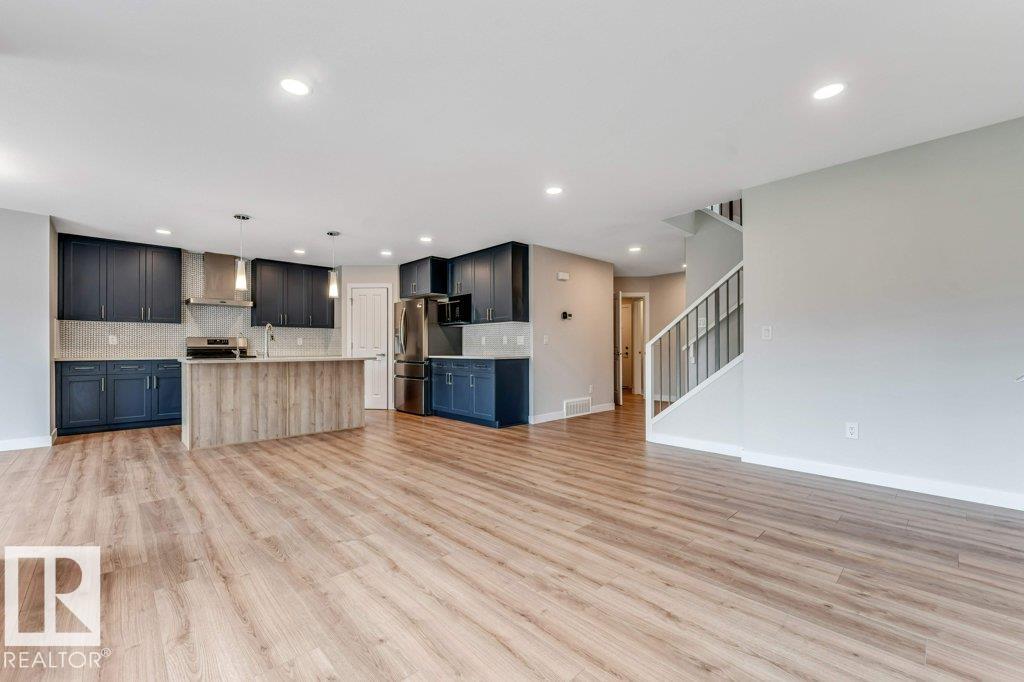 Photo 8 at 403 35 Avenue NW, Maple Crest, Edmonton