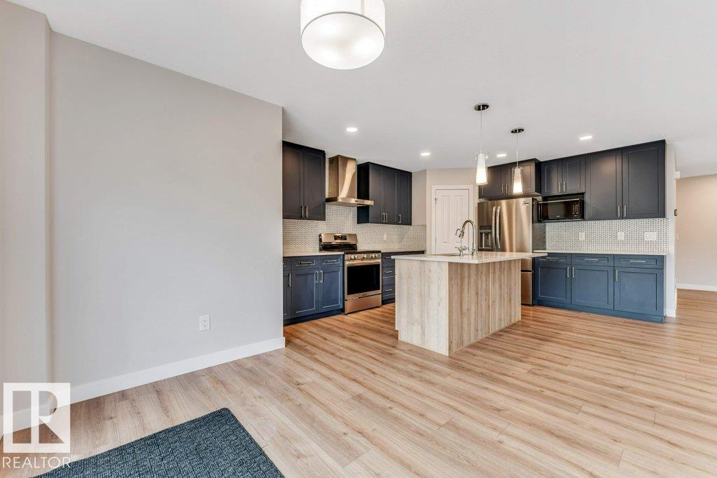 Photo 10 at 403 35 Avenue NW, Maple Crest, Edmonton