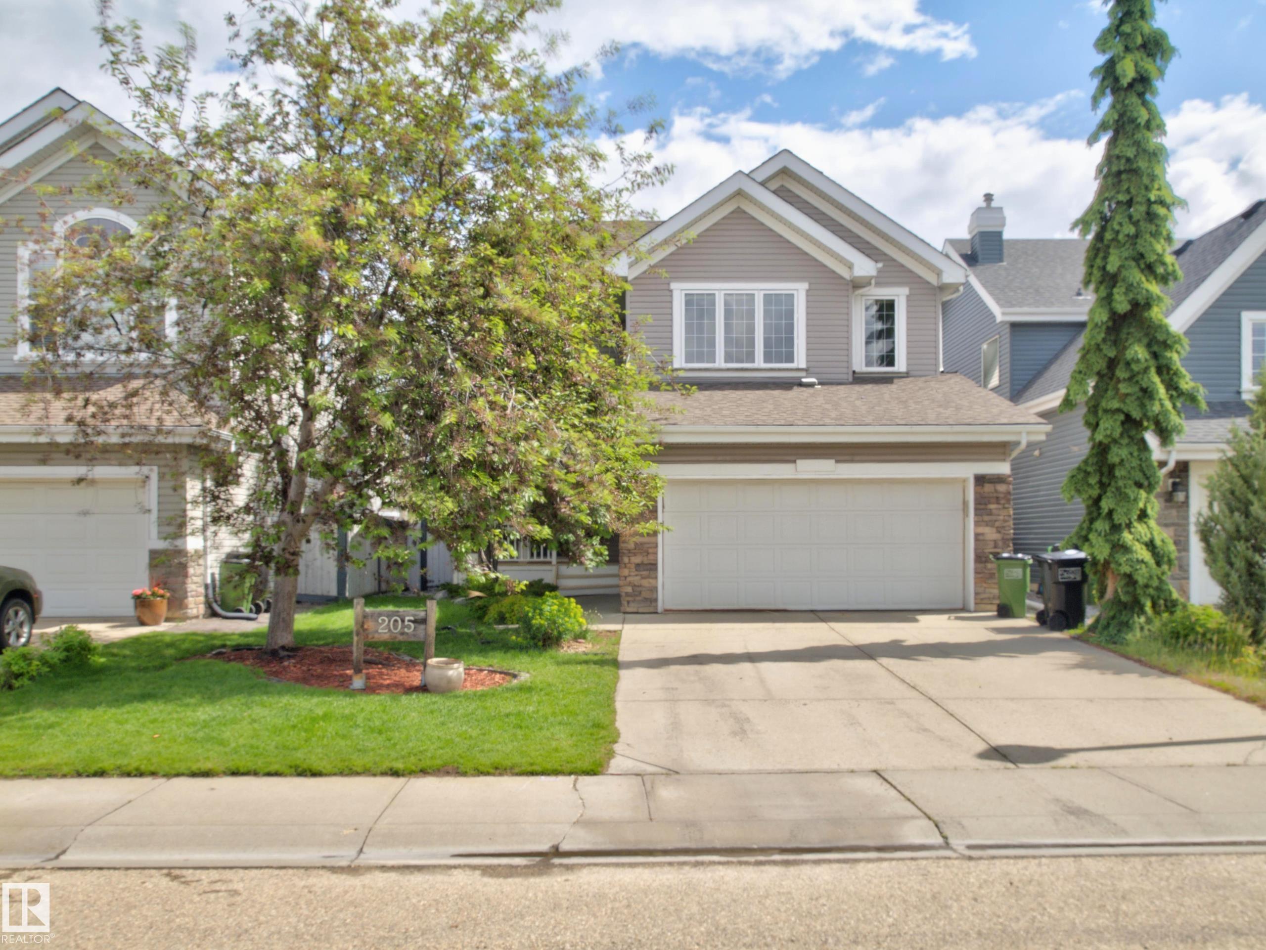 Photo 2 at 205 Sheppard Court SW, Summerside, Edmonton