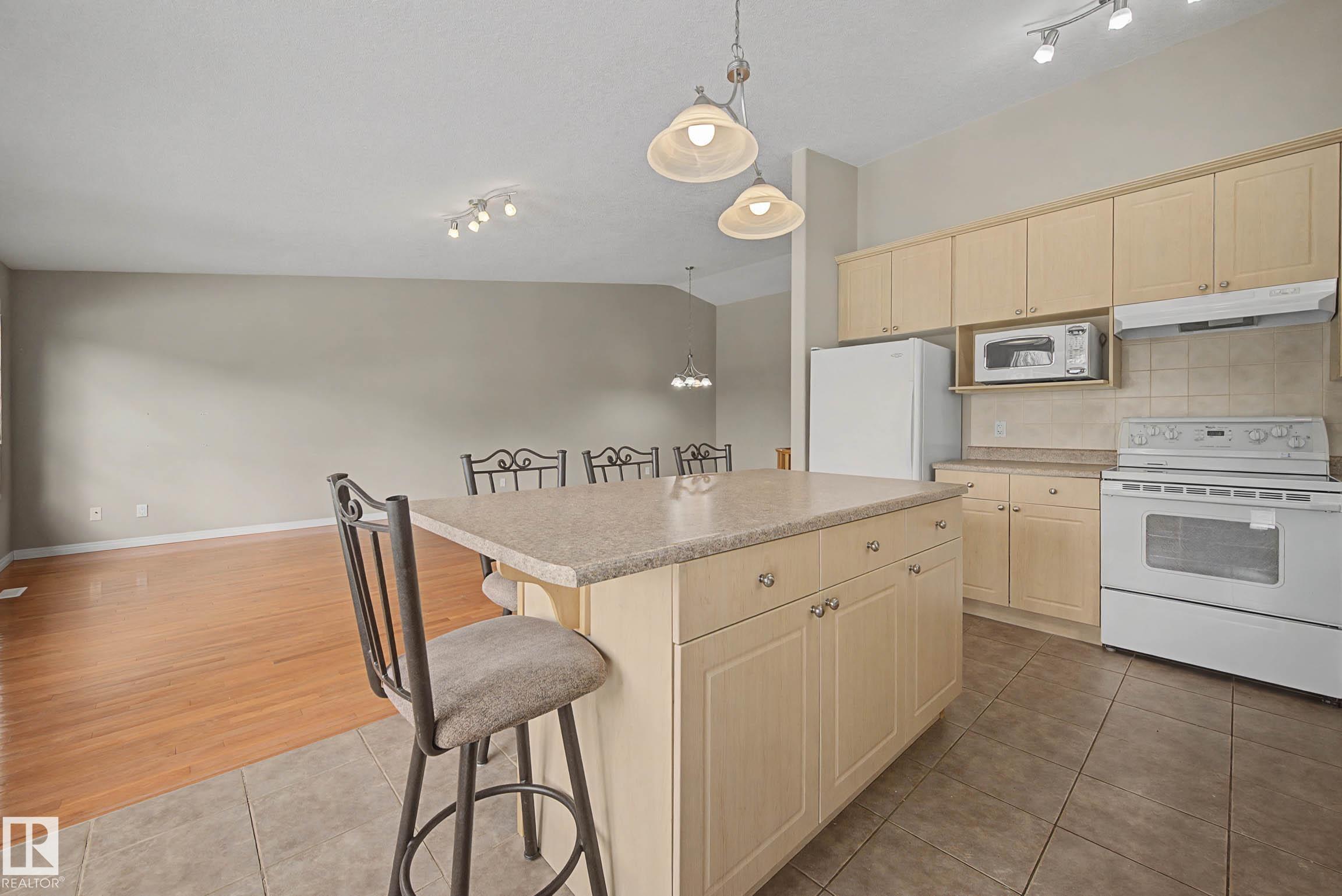 Photo 15 at 6 - 2031 Brennan Crescent NW, Breckenridge Greens, Edmonton