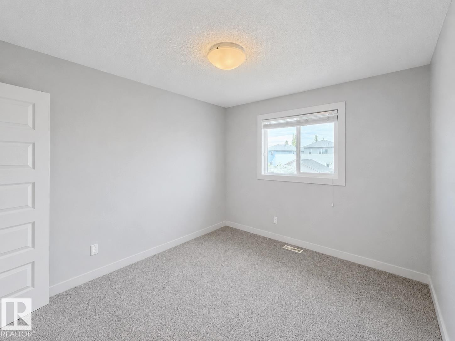 Photo 27 at 6925 Cardinal Wynd SW, Chappelle Area, Edmonton