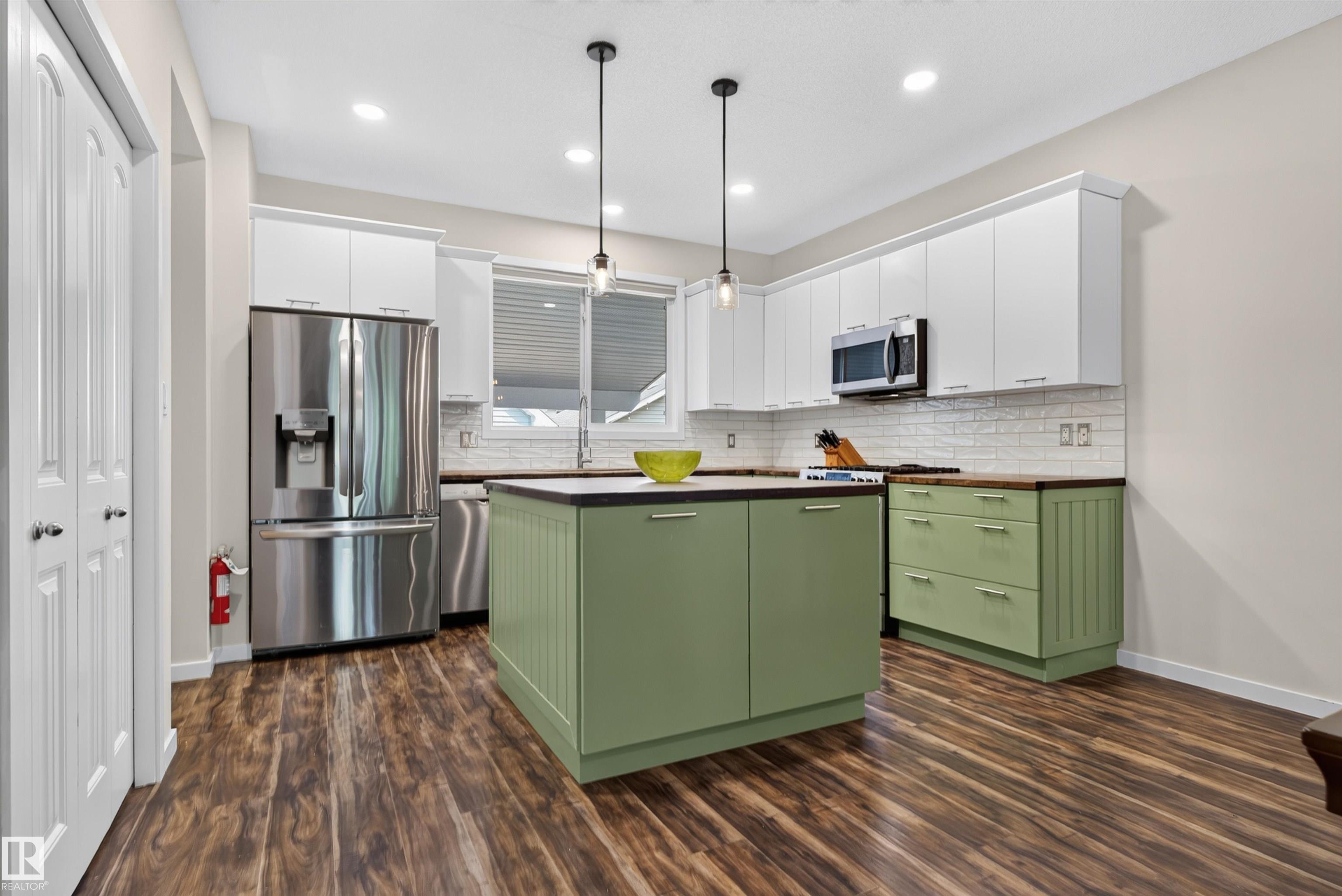 Photo 9 at 6928 22 Avenue SW, Summerside, Edmonton