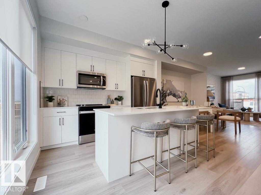 Photo 6 at 7452 Klapstein Crescent SW, Keswick, Edmonton