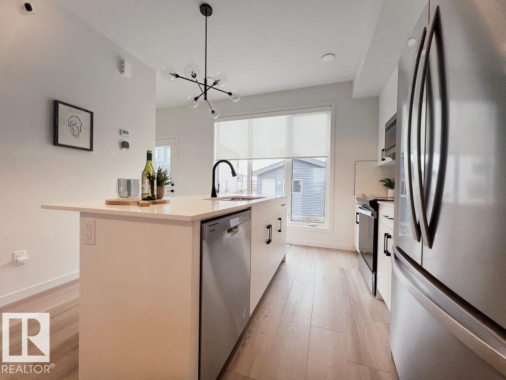 Photo 7 at 7452 Klapstein Crescent SW, Keswick, Edmonton