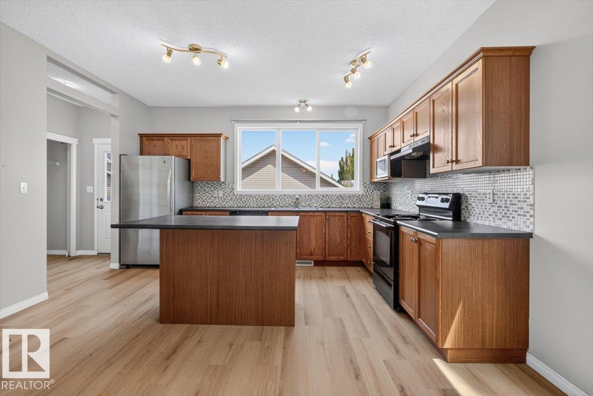 Photo 11 at 7704 16 Avenue SW, Summerside, Edmonton