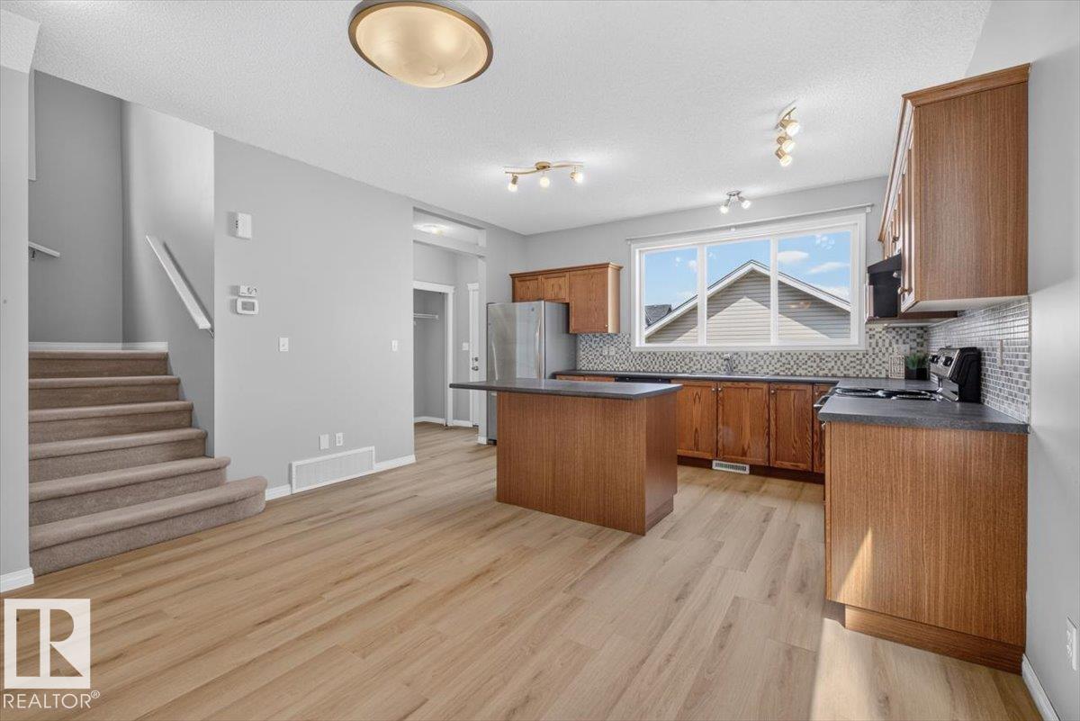 Photo 12 at 7704 16 Avenue SW, Summerside, Edmonton