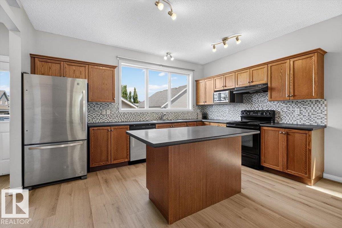 Photo 13 at 7704 16 Avenue SW, Summerside, Edmonton