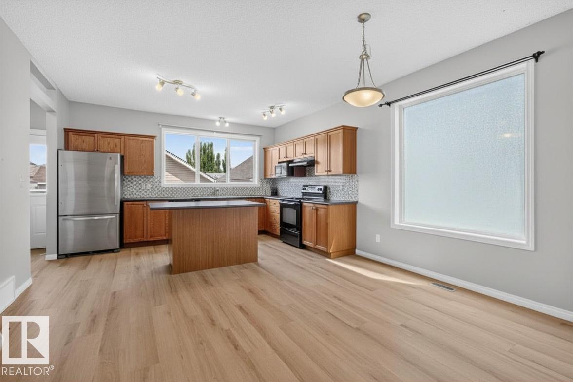 Photo 10 at 7704 16 Avenue SW, Summerside, Edmonton