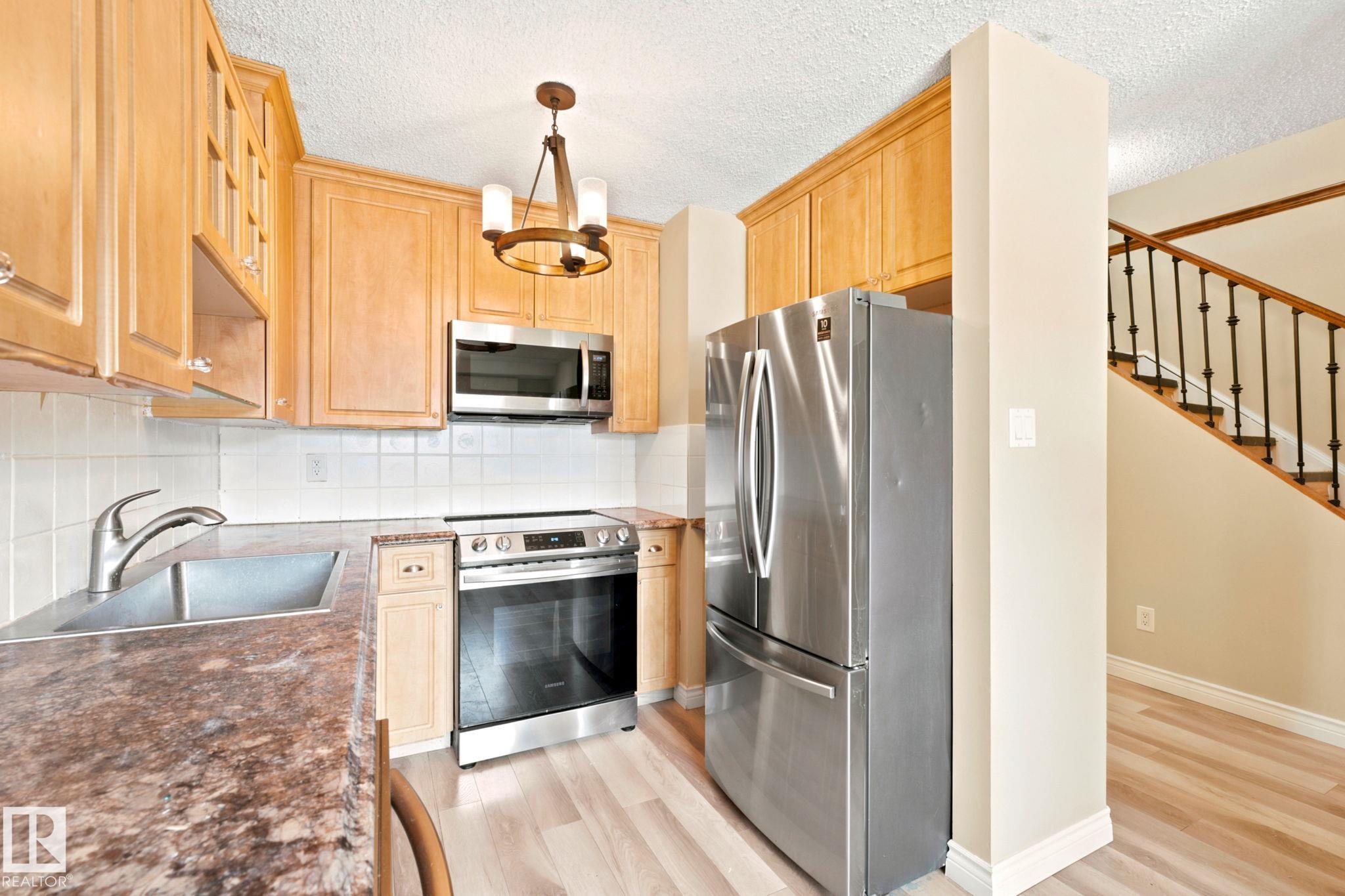 Photo 9 at 41 - 4707 126 Avenue NW, Homesteader, Edmonton