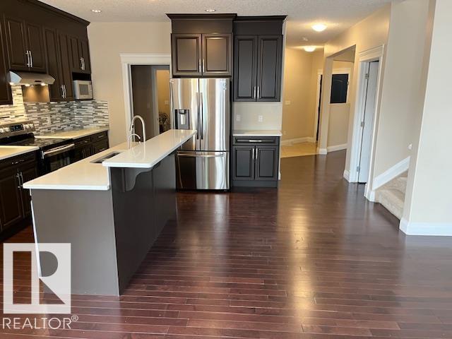 Photo 8 at 805 Hodgins Road NW, The Hamptons, Edmonton