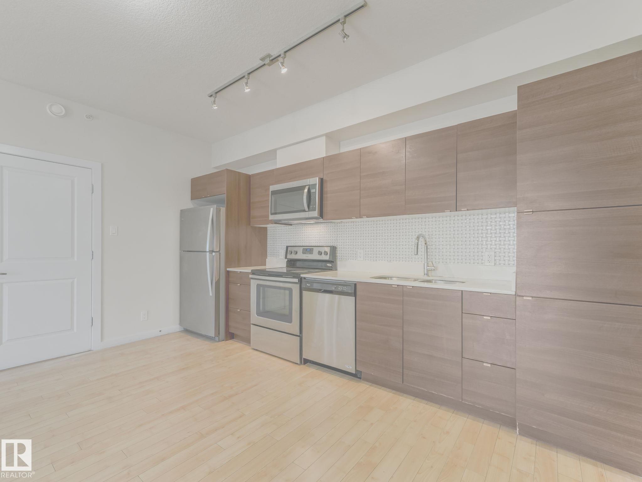 Photo 4 at 406 - 9519 160 Avenue NW, Eaux Claires, Edmonton