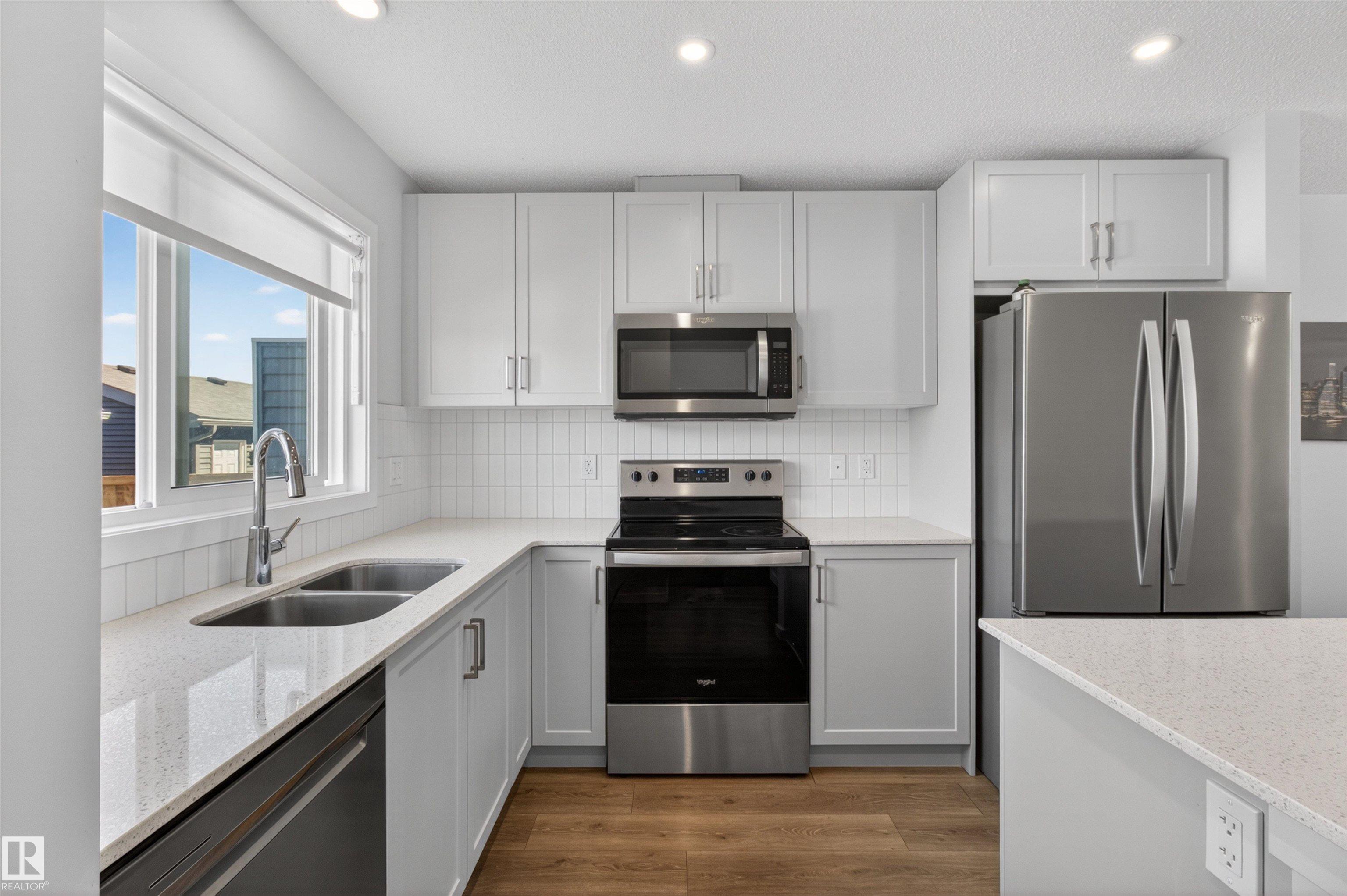Photo 10 at 2422 Trumpeter Way NW, Trumpeter Area, Edmonton