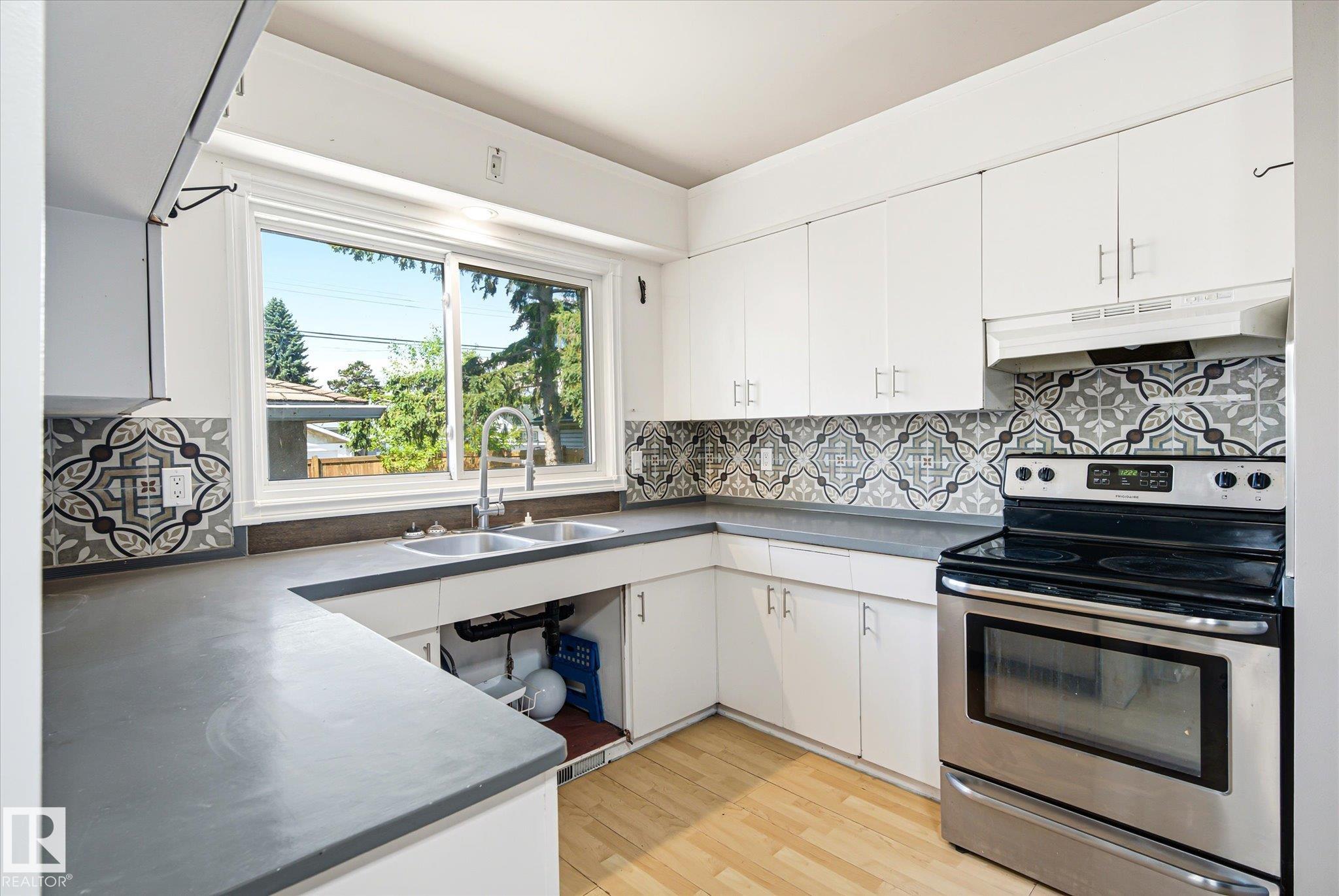 Photo 7 at 13104 132 Street NW, Athlone, Edmonton