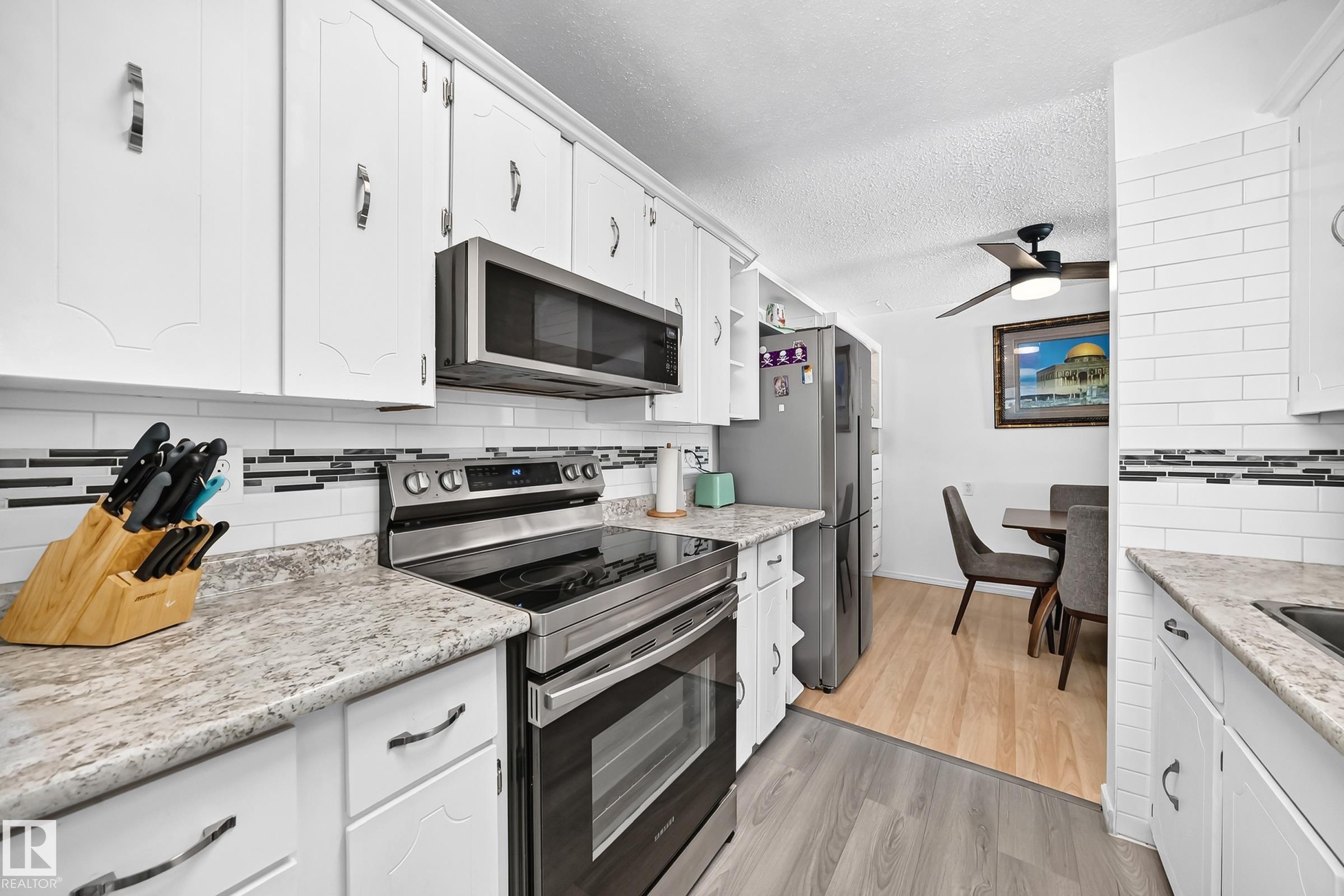 Photo 11 at 13317 47 Street NW, Sifton Park, Edmonton