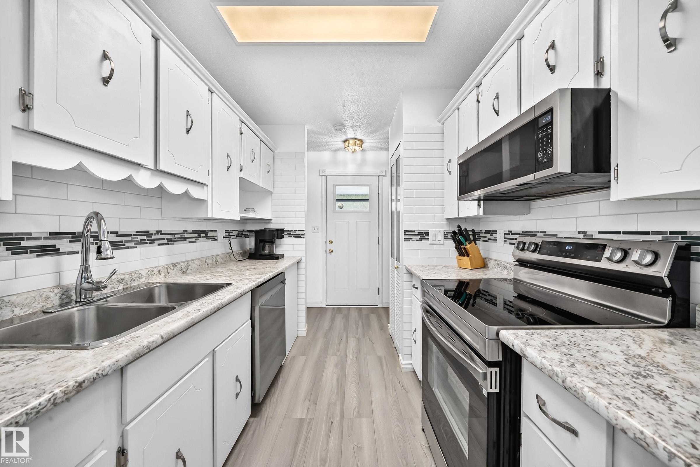 Photo 7 at 13317 47 Street NW, Sifton Park, Edmonton