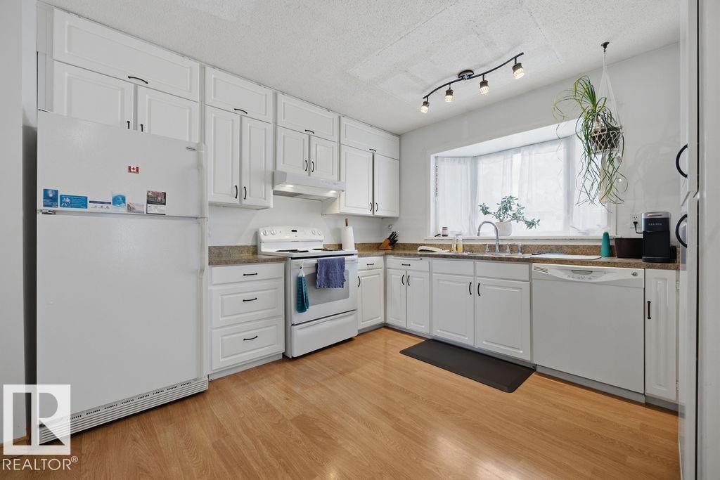 Photo 11 at 14612 117a Street NW, Caernarvon, Edmonton