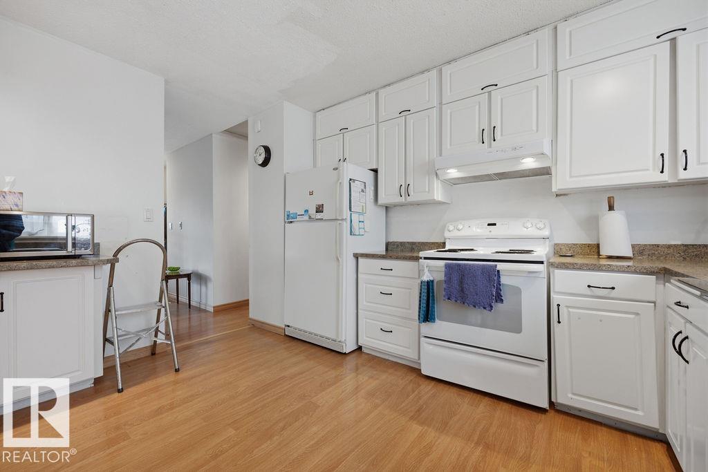 Photo 14 at 14612 117a Street NW, Caernarvon, Edmonton