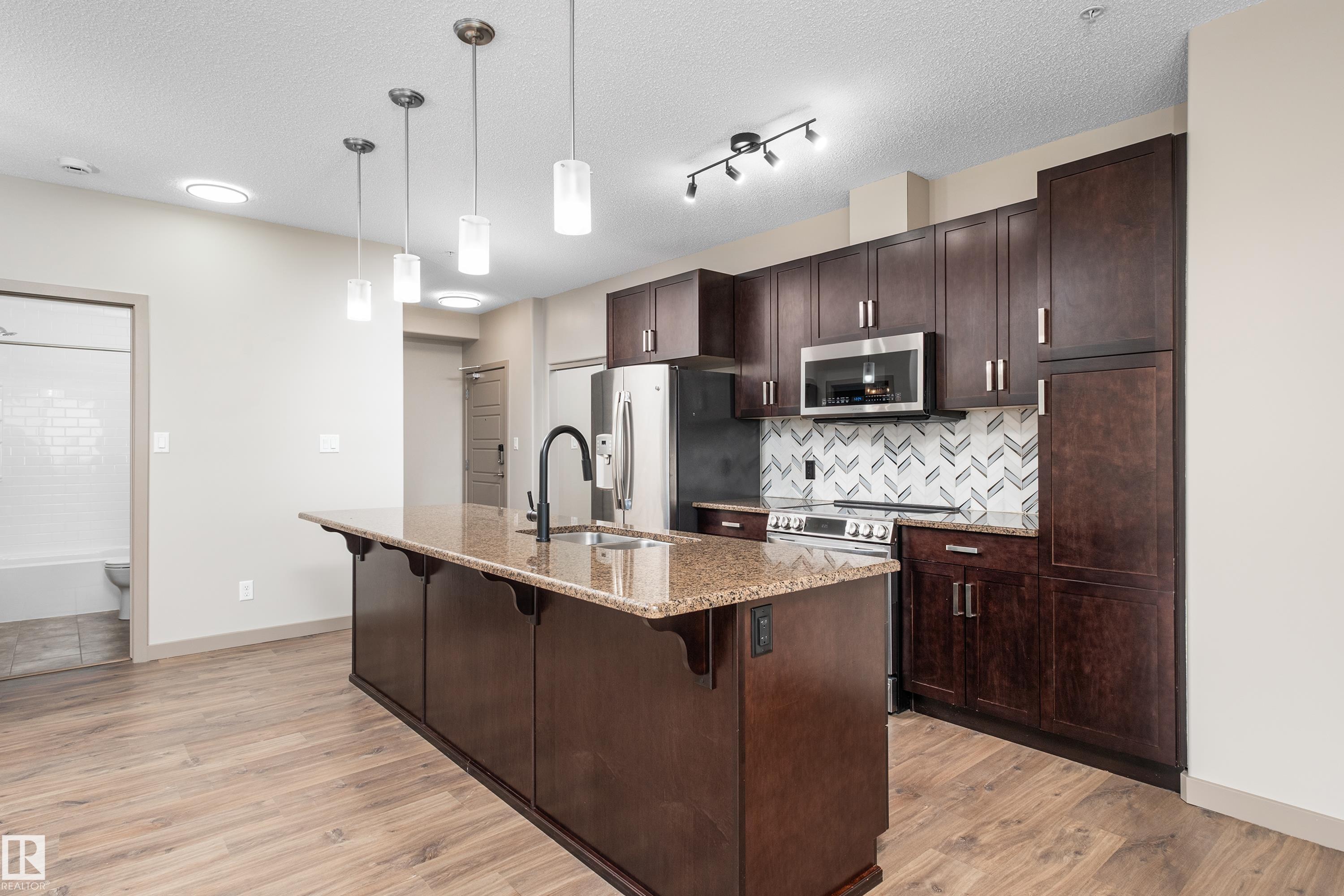 Photo 12 at 323 - 320 Ambleside Link SW, Ambleside, Edmonton