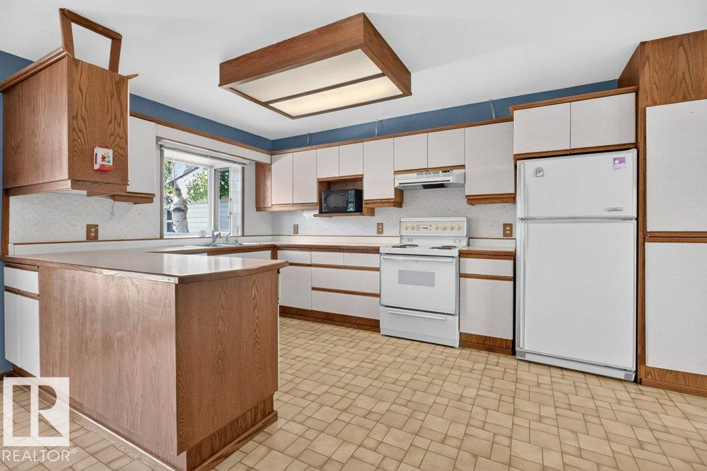 Photo 10 at 13008 135 Street NW, Athlone, Edmonton