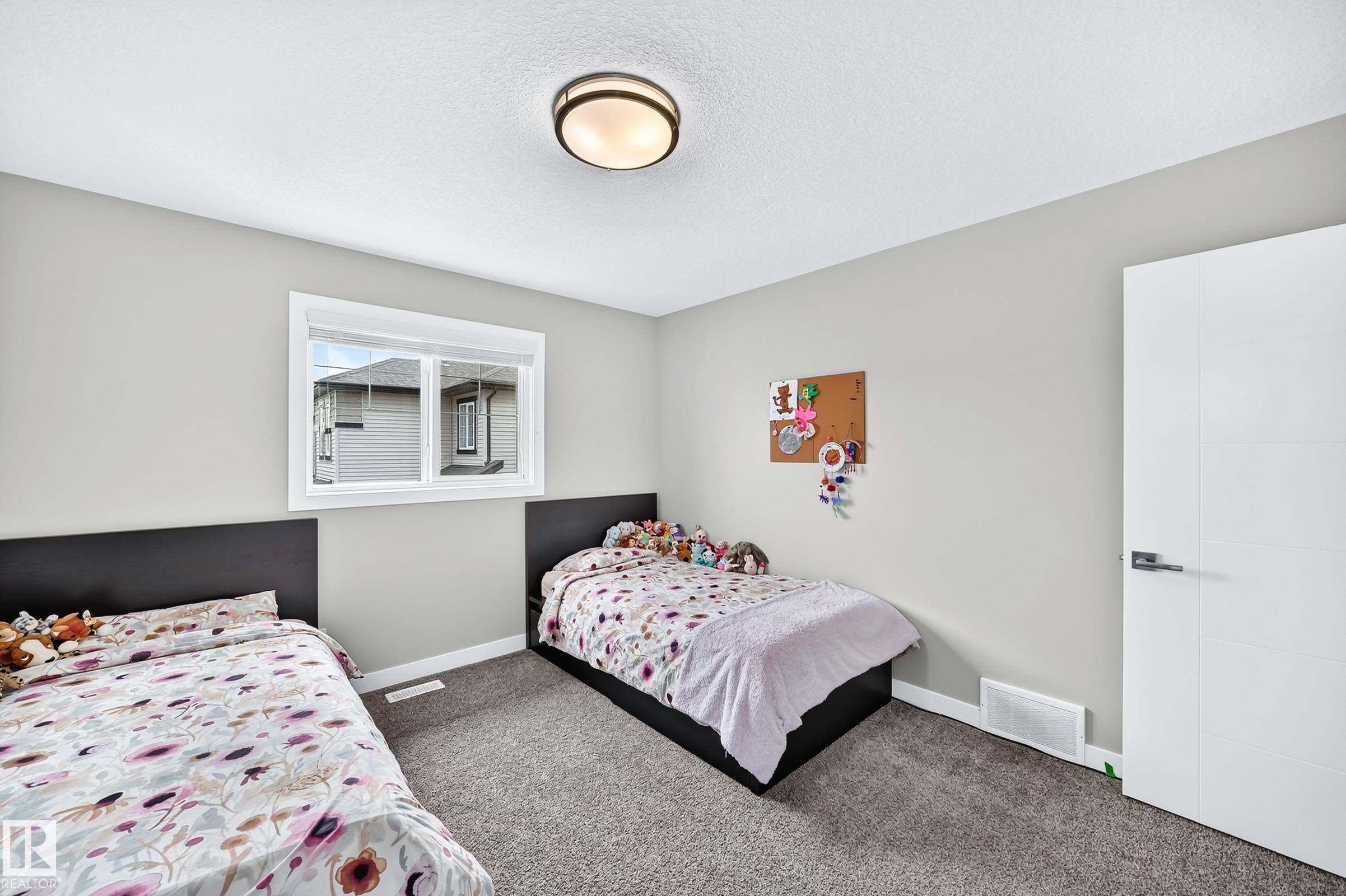 Photo 32 at 8548 Cushing Place SW, Chappelle Area, Edmonton