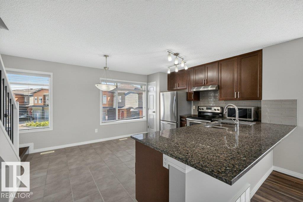 Photo 20 at 39 - 7503 Getty Gate NW, Granville, Edmonton