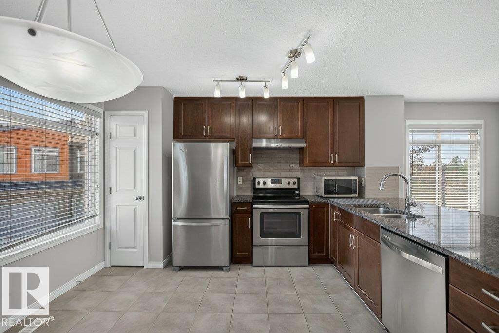 Photo 22 at 39 - 7503 Getty Gate NW, Granville, Edmonton
