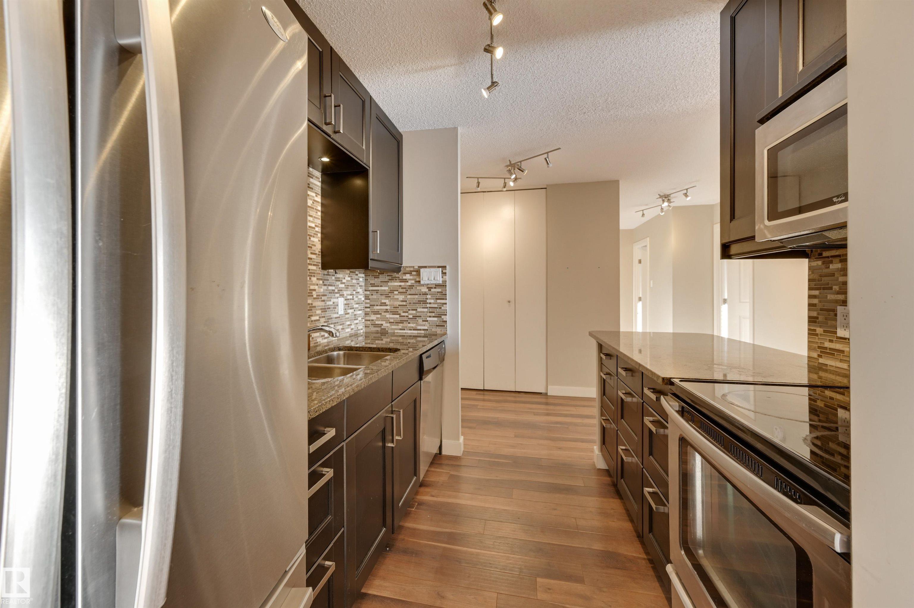 Photo 13 at 406 - 12141 Jasper Avenue NW, Wîhkwêntôwin, Edmonton