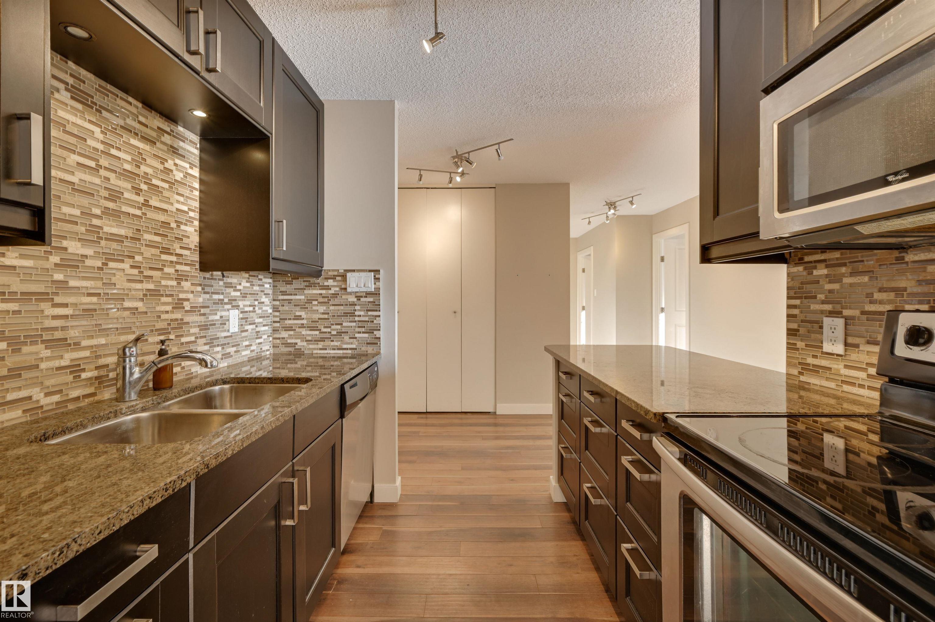 Photo 14 at 406 - 12141 Jasper Avenue NW, Wîhkwêntôwin, Edmonton