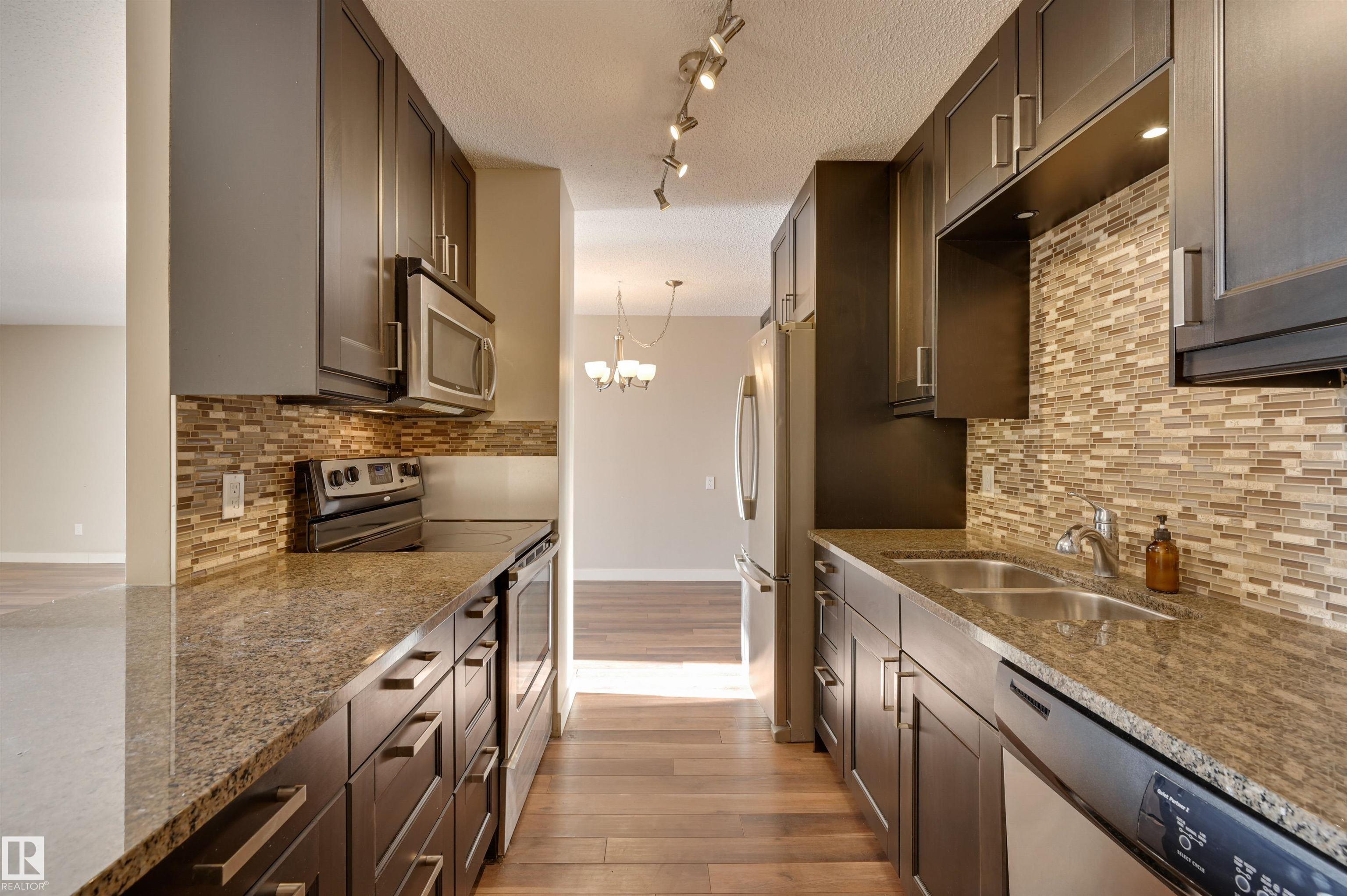 Photo 16 at 406 - 12141 Jasper Avenue NW, Wîhkwêntôwin, Edmonton