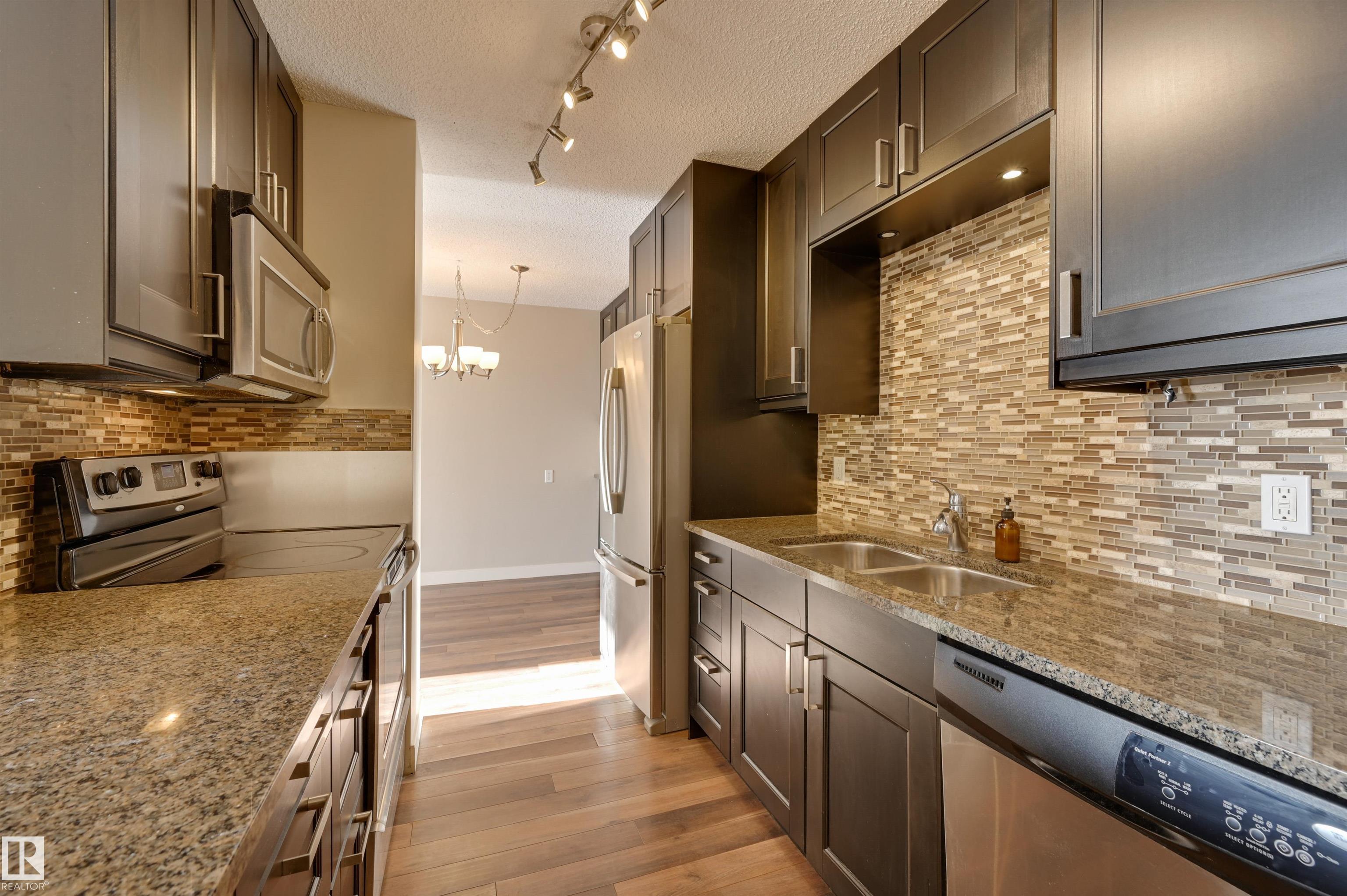 Photo 17 at 406 - 12141 Jasper Avenue NW, Wîhkwêntôwin, Edmonton
