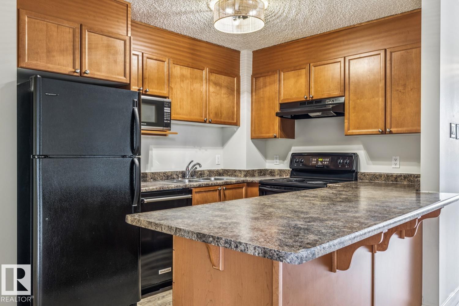 Photo 6 at 404 - 9715 110 Street NW, Wîhkwêntôwin, Edmonton
