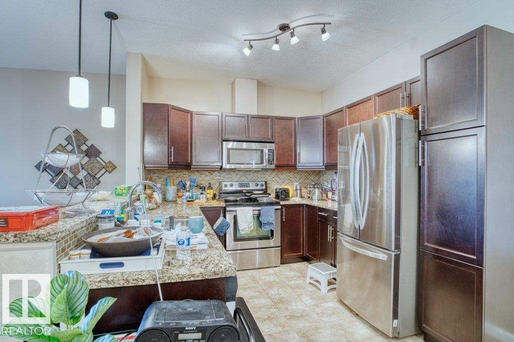 Photo 6 at 319 - 6083 Maynard Way NW, MacTaggart, Edmonton