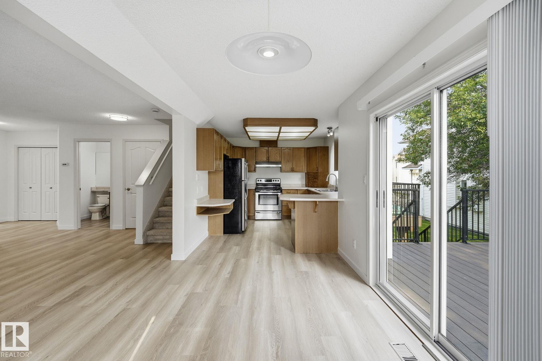 Photo 11 at 8 - 10 Devon Close, Deer Ridge, St. Albert