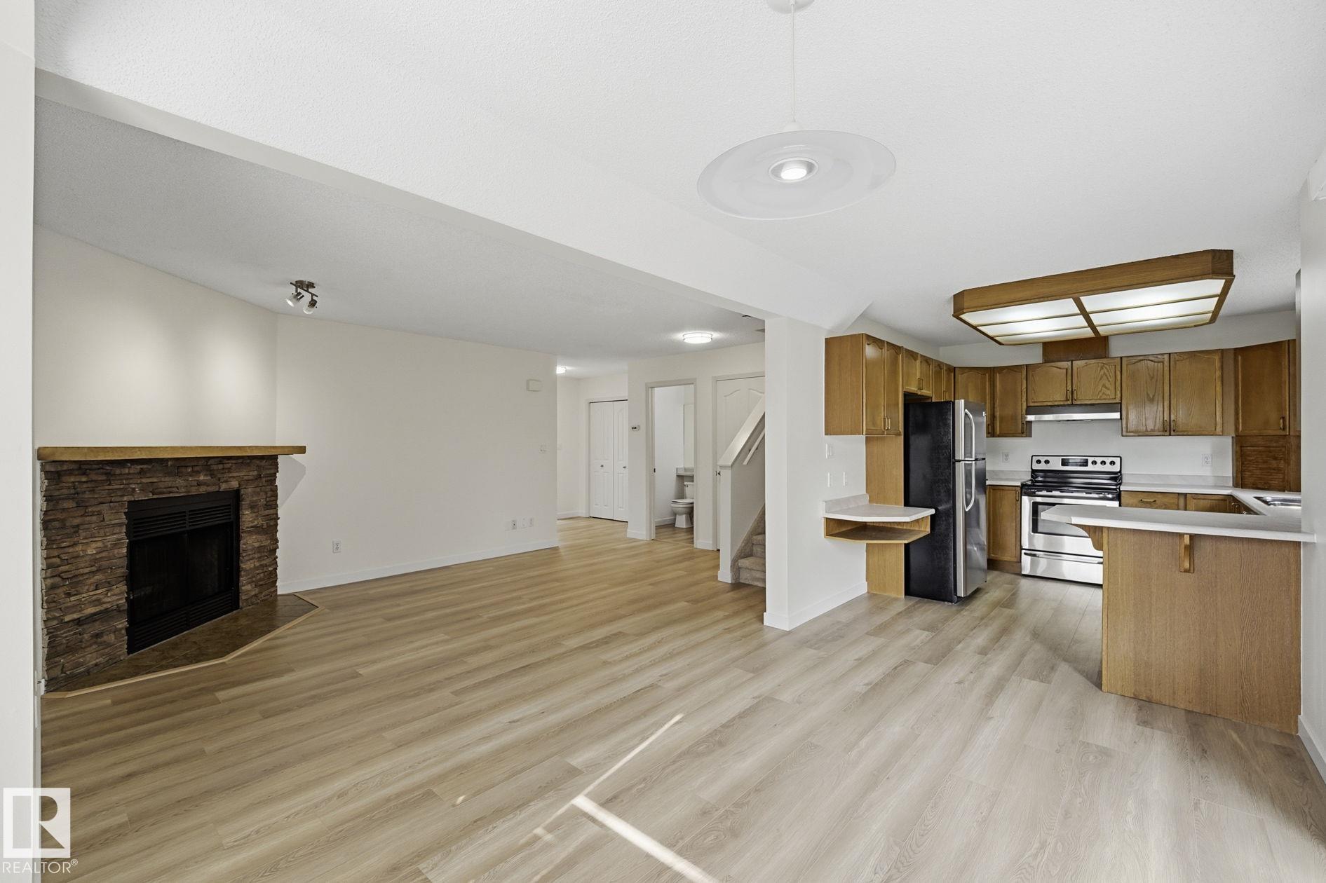 Photo 12 at 8 - 10 Devon Close, Deer Ridge, St. Albert